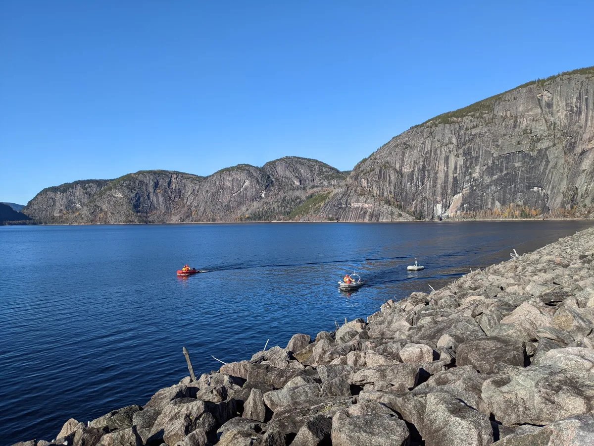 Survey boats measuring over water · Willowstick field operations (Canada)